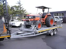 Tractor Mower Trailer — Heavy-duty trailers designed specifically for transporting tractor mowers and similar equipment.