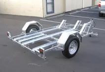 Motorbike Trailer — Secure trailers for transporting motorcycles with tie-down points and wheel chocks.
